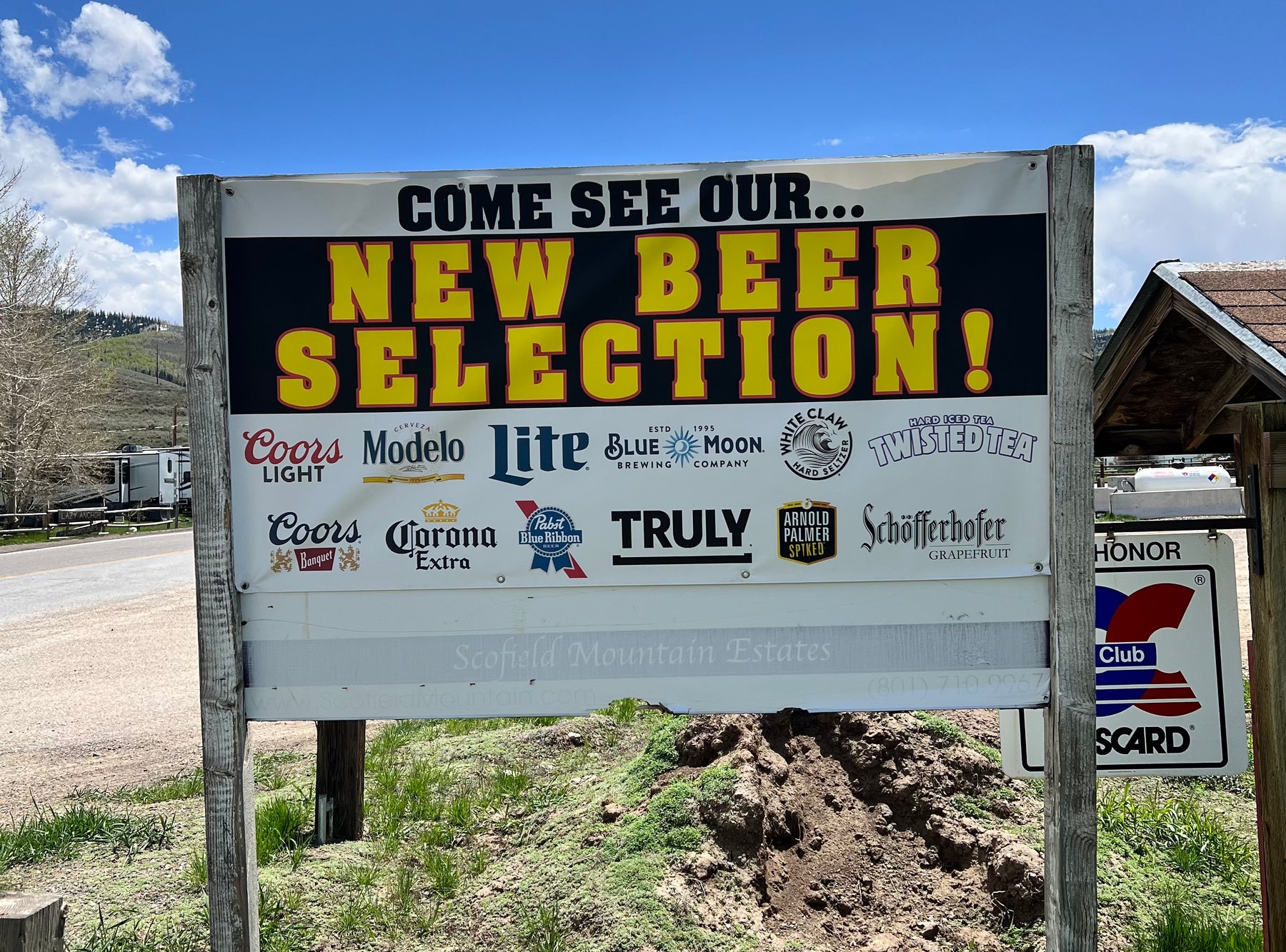 Sign in Scofield Utah saying they are carrying every beer but Anheuser-Busch beer 